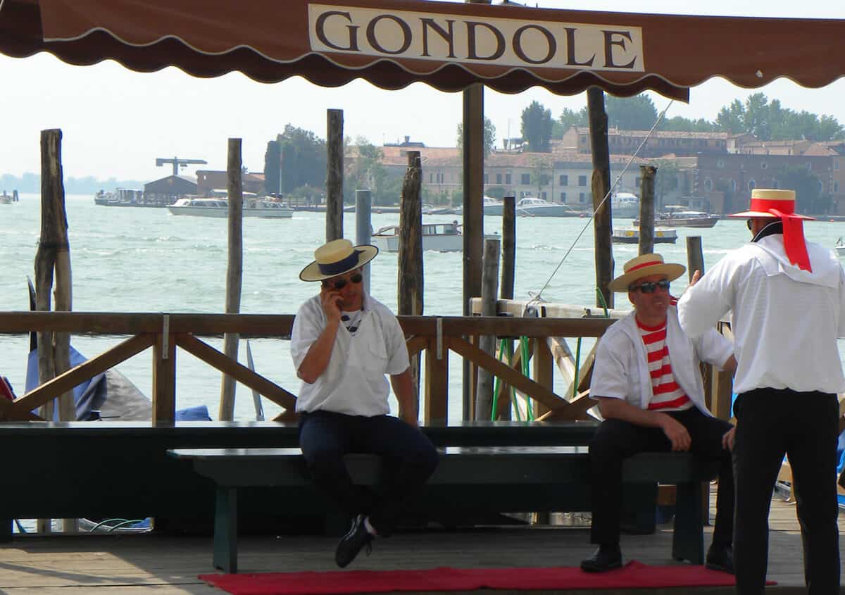 gondoliers in Venice