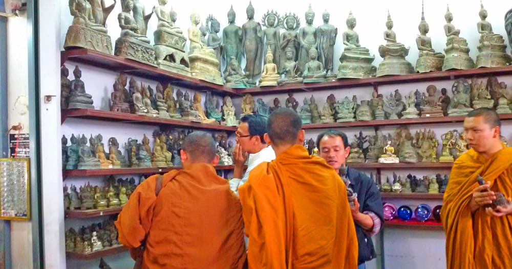 monks at the Tha Sadet Market in Nong Khai, Thailand