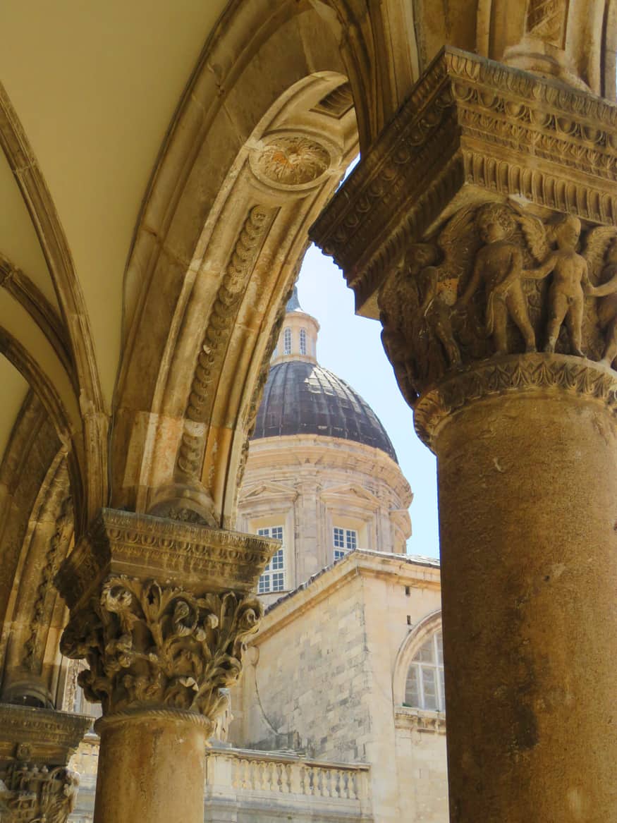 views of Cathedral through arches of Rectors Palace, Dubrovnik Croatia