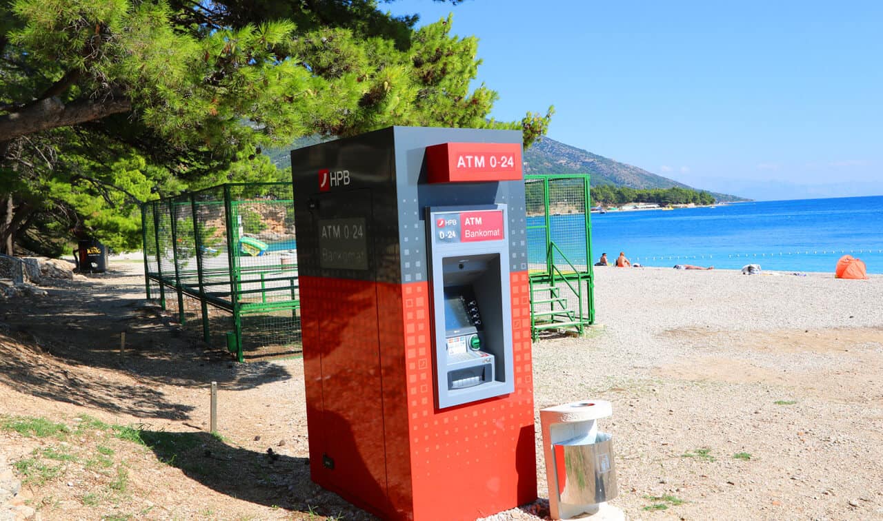 ATM on Zlatni Rat beach, Brač Island, Croatia