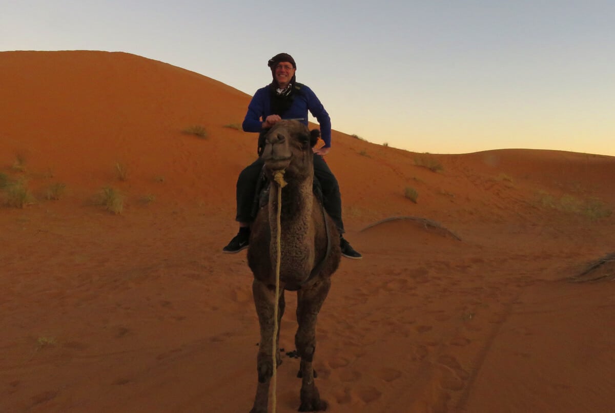 riding a camel in the desert, Merzouga. Why Merzouga was a highlight of my 5 week Morocco trip