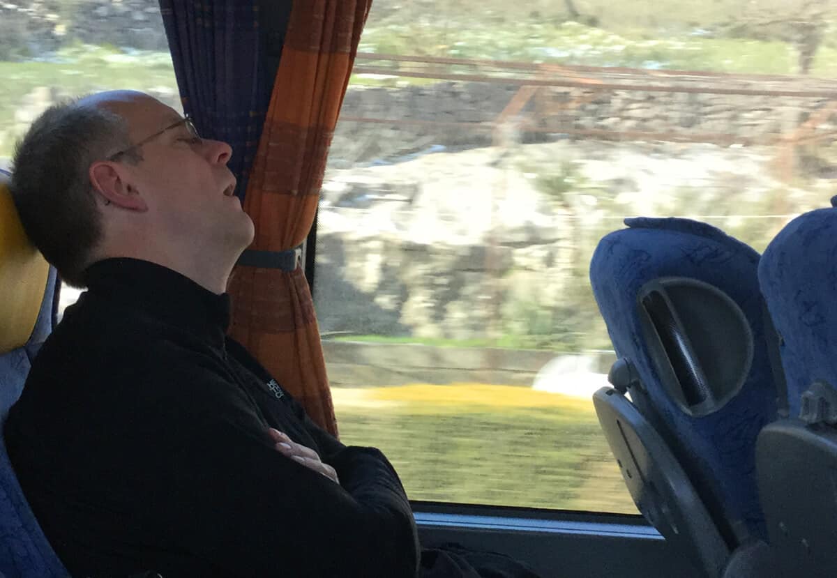 sleeping on a bus in the Balkans