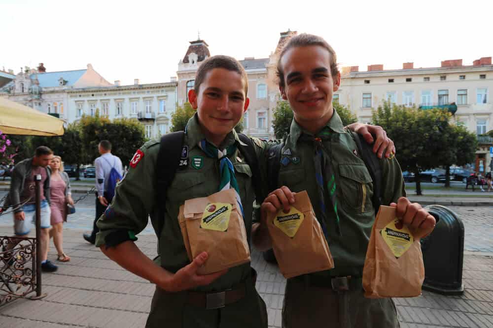 Boy scouts selling cookies in Lviv, Ukraine