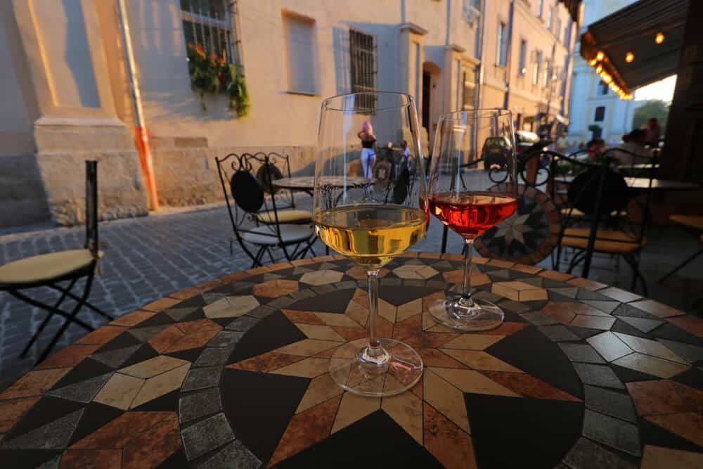 drinking wine and selfie pose in Lviv. Why we loved our Summer in Lviv (in photos)