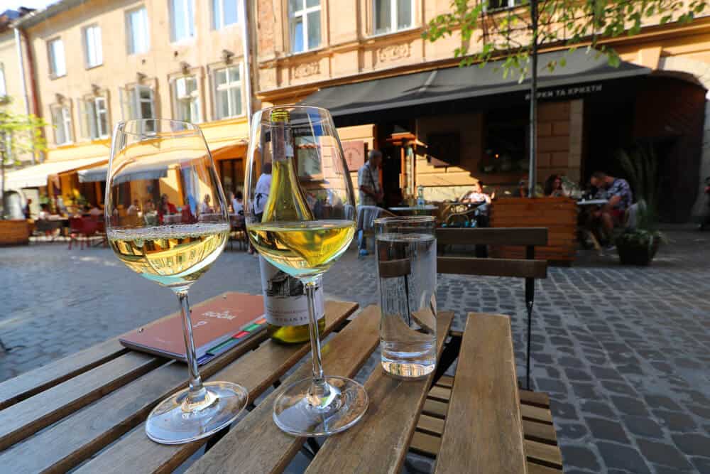Drinking wine in Lviv, Ukraine. Why we loved our Summer in Lviv (in photos)