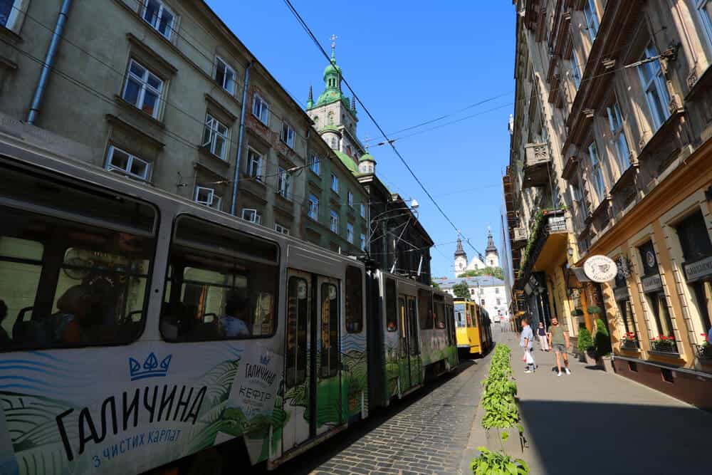 Views of a tram and churches in Lviv. Why we loved our Summer in Lviv (in photos)