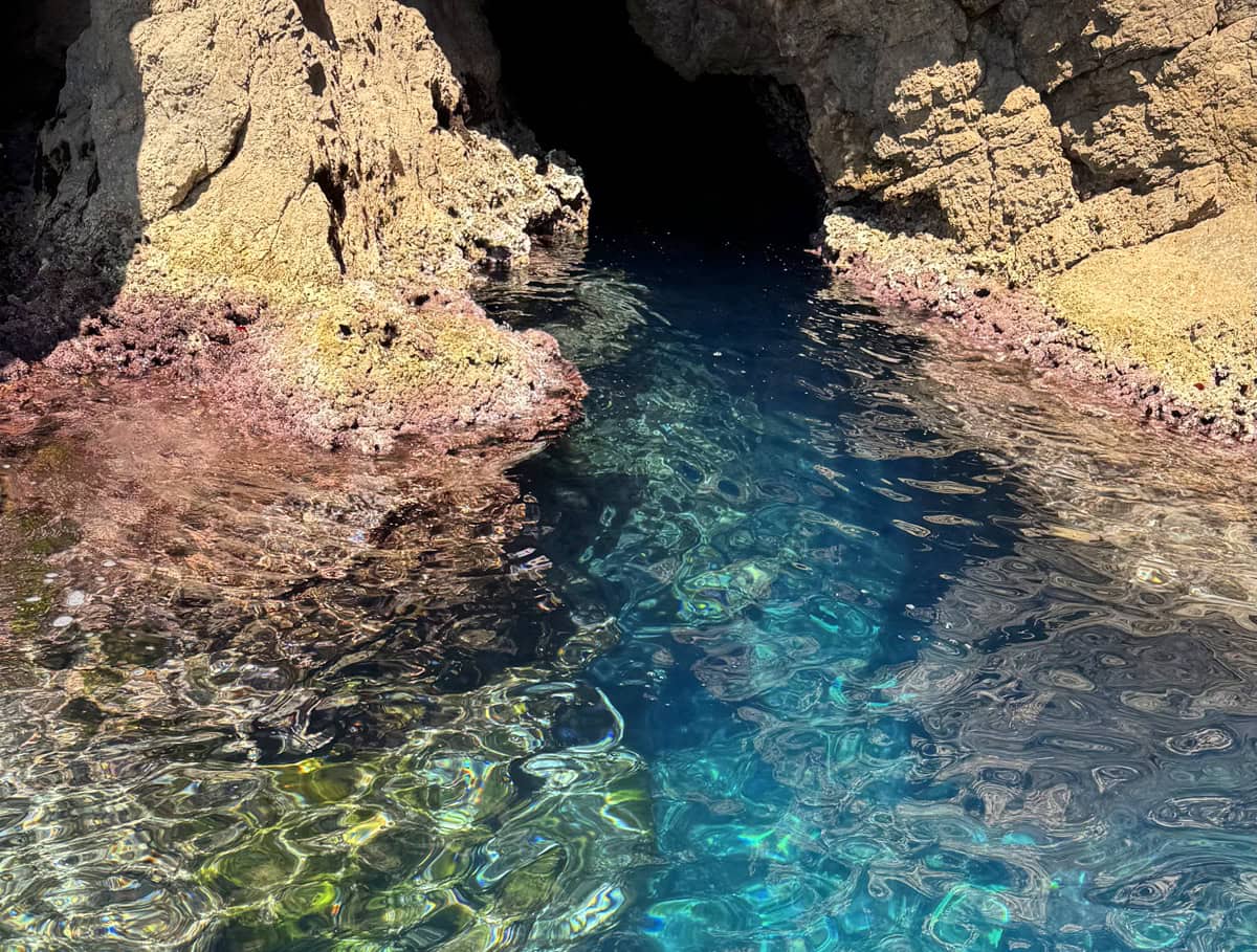 Crystal-clear turquoise water at the entrance of the Blue Cave near Dubrovnik